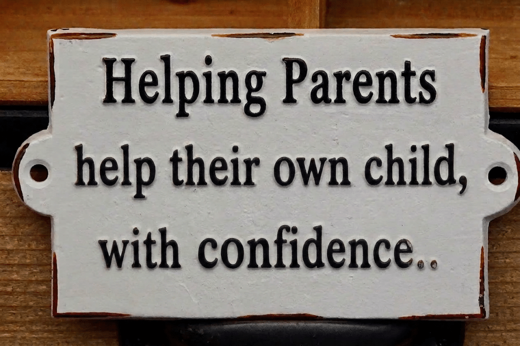 A rustic plaque that reads, "This is our happy place".